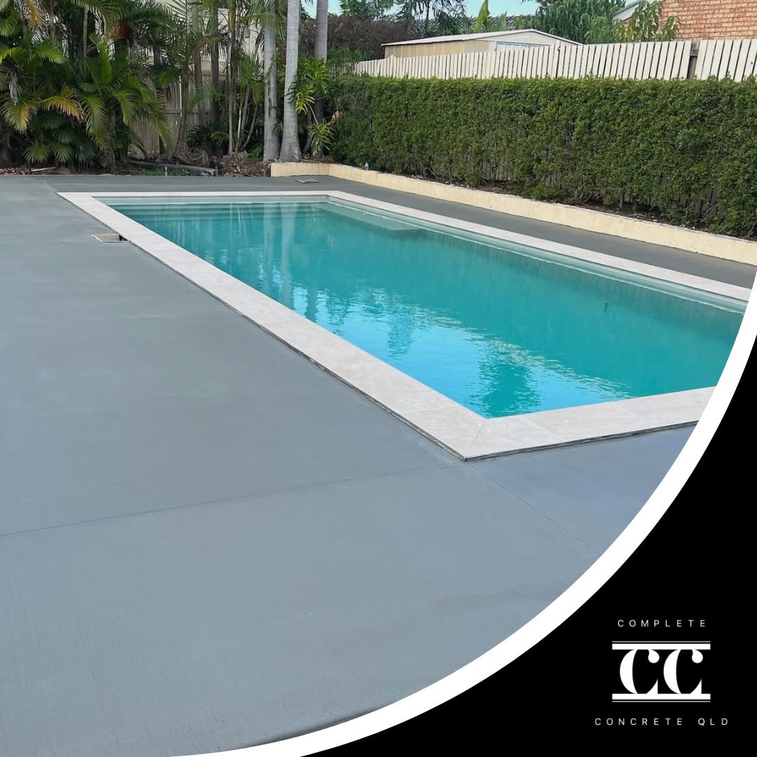 Exposed concrete pool surround by Complete Concrete Qld